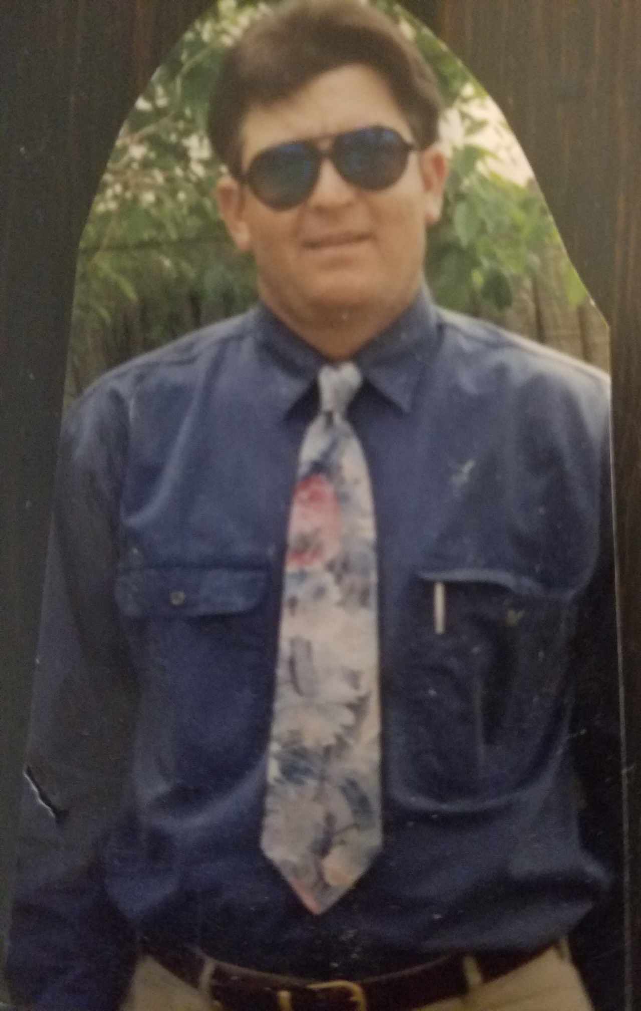 Damaged photo — before